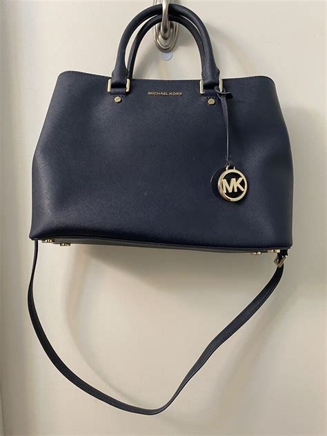 sell used michael kors handbags